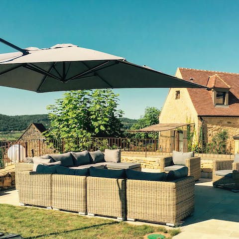 Relax on the terrace with a glass of wine and admire the countryside views