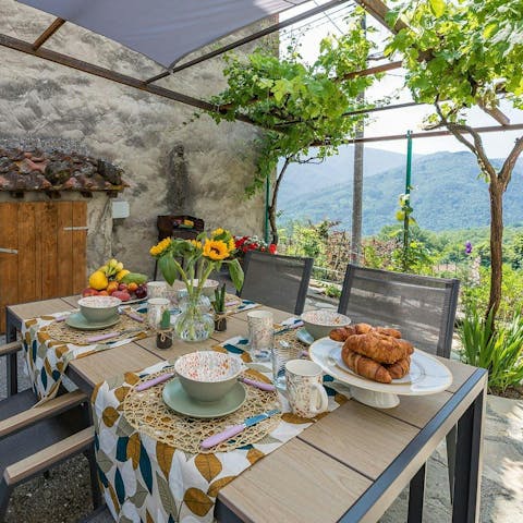 Enjoy alfresco dining with a view on the terrace