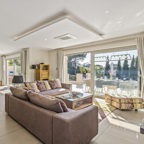 Slide open the glass doors to blend indoors with outdoors