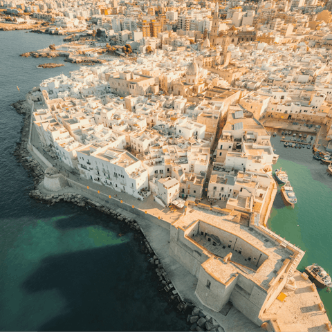 Drive to the coastal town of Monopoli, thirty-seven minutes away