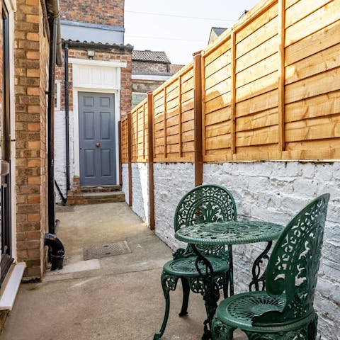 Enjoy a morning cup of coffee in the private courtyard
