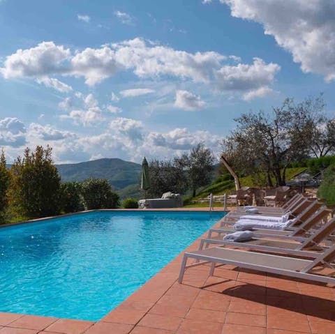 Soak up the sun by the exquisite pool
