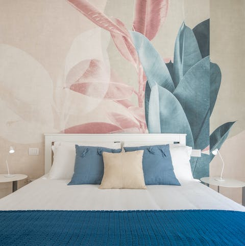 Wake up in the colourful bedroom feeling rested and ready for another day of Milan sightseeing