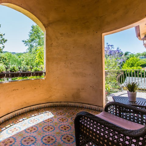 Have a moment to yourself in the shade of the turret balcony