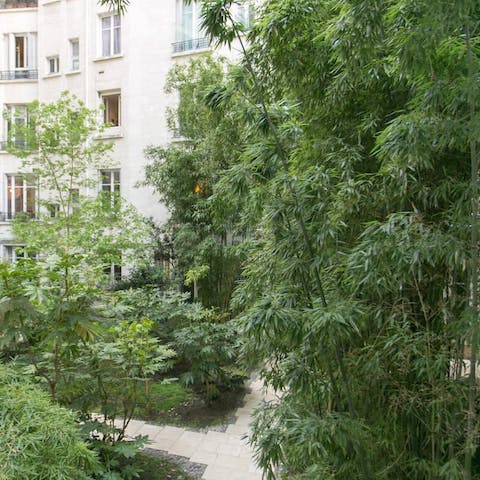 Have a wander around the lush communal courtyard gardens
