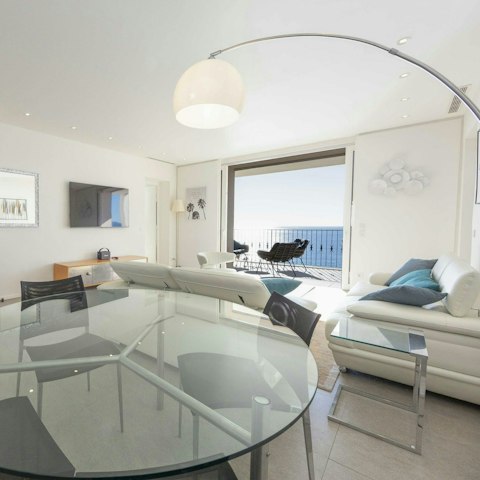 Have a glass of Champagne in the light-filled living room
