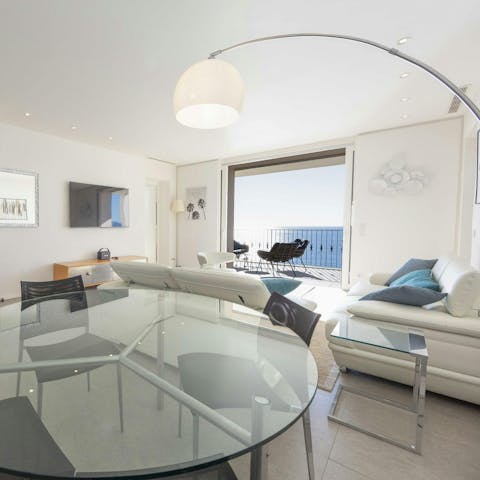 Have a glass of Champagne in the light-filled living room