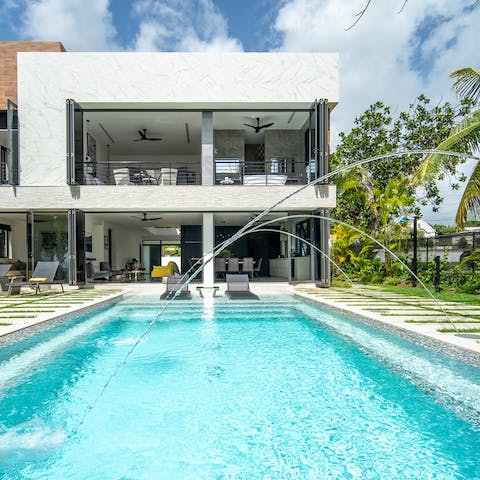 Stay cool in the Caribbean sun thanks to a private pool, complete with water features