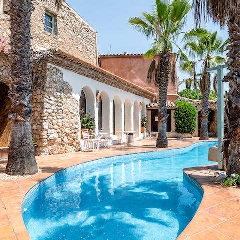 Feel like you're in paradise swimming in the communal pool