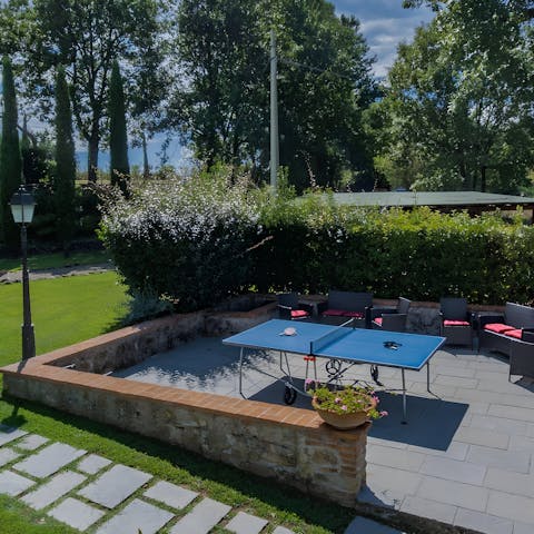 Chill out with a game of table tennis in one of the home's outside living areas