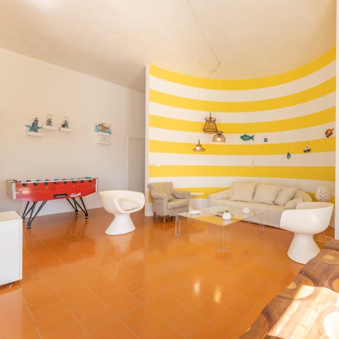 Play foosball in the colourful living space