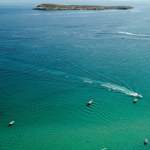 Stay with the turquoise waters of Golden Beach a short stroll away