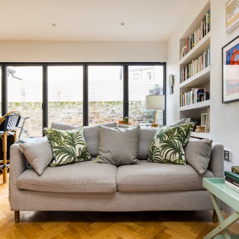 Chill out in the bright living space with a glass of your favourite tipple