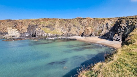 Uncover Pembrokeshire's intimate hidden coves tucked beneath ancient sea cliffs