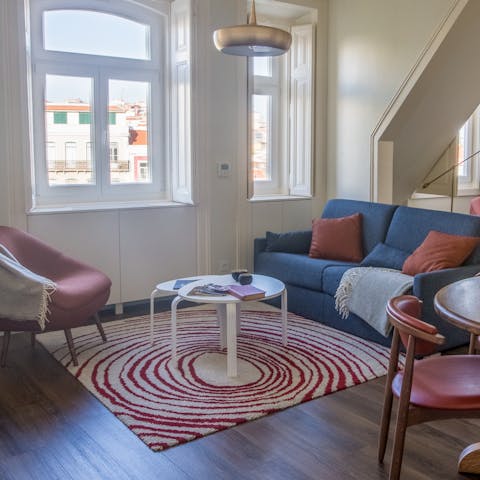 Enjoy a pleasing view out over the rooftops of Lisbon from your living room window