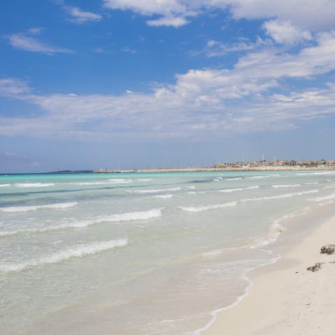 Jump in the car and take the quick five-minute drive to Platja des Dolç for an afternoon relaxing on the soft sands