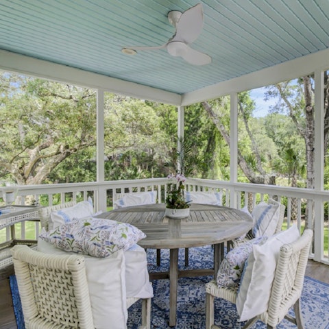Enjoy afternoon tea on the terrace overlooking the lush gardens