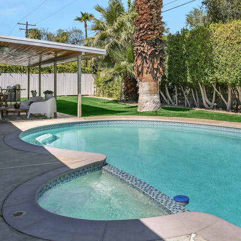 Relax with a glass of bubbly in the hot tub
