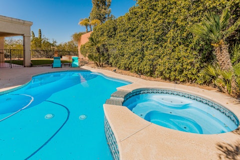 Cool off in the pool or ease into the hot tub