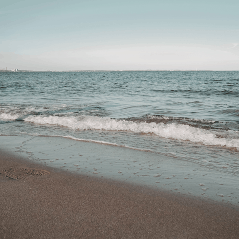 Drive five minutes to Plaka Beach and spread out on the sand