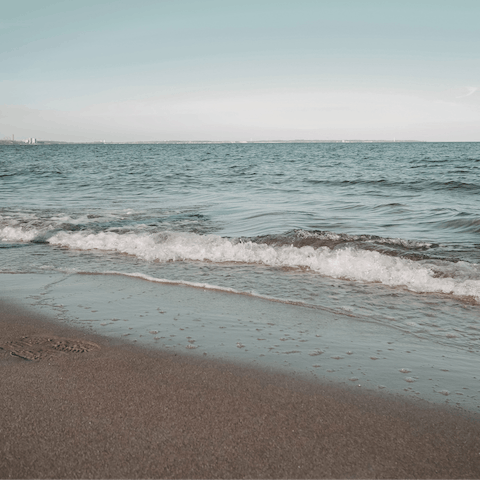 Drive five minutes to Plaka Beach and spread out on the sand
