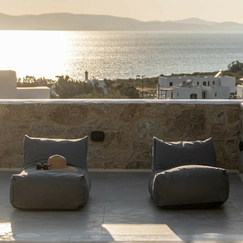Find a spot to relax with a glass of something chilled at sundown