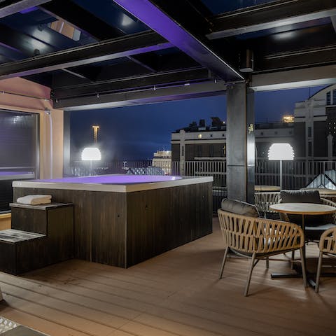 Head down to the communal terrace and relax in the Jacuzzi