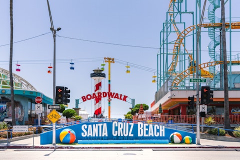 Ride the historic Giant Dipper roller coaster at Santa Cruz Beach Boardwalk, about thirty minutes by car