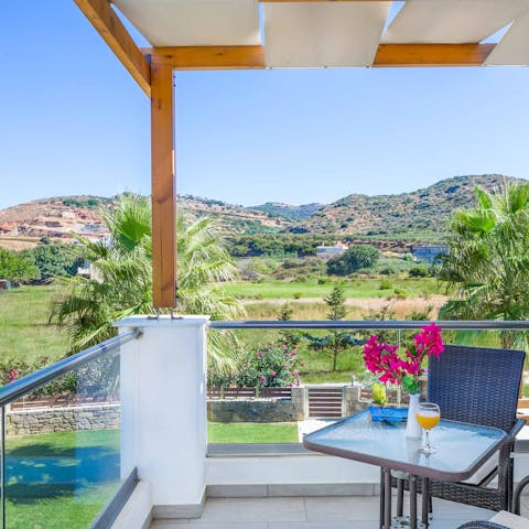 Enjoy your breakfast on the balcony with views of the Aegean sea