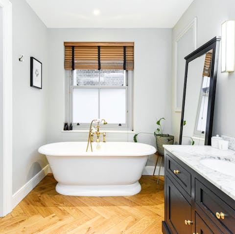 Take a relaxing soak in the bath after a long day on your feet