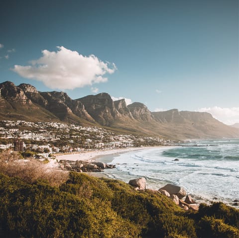 Head down to the dazzling sandy shores of Camps Bay, just a short flip flop away
