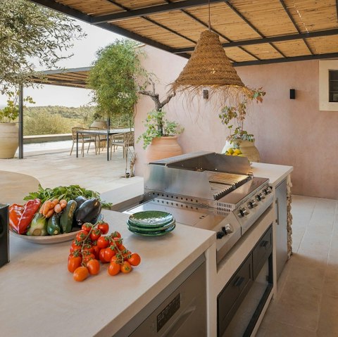 Cook up meals in the outdoor kitchen