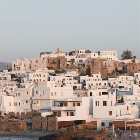 Explore vibrant Naxos Town, 2 kilometres away