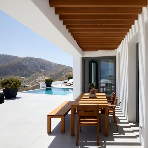 Gather on the sun-dappled patio for tomato gefthedes and a Greek salad