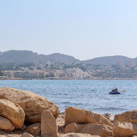 Explore the cobbled streets and market square of Moraira, a beautiful coastal town