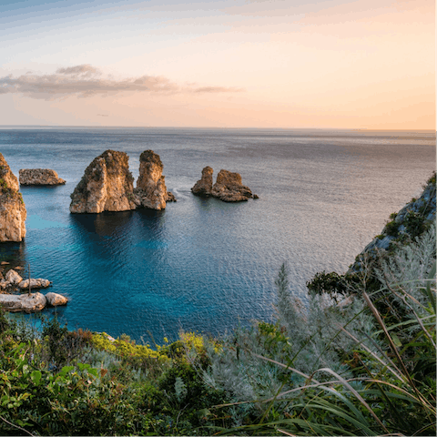 Spend a day on the sands of Spiaggia San Vito lo Capo, just 1km away