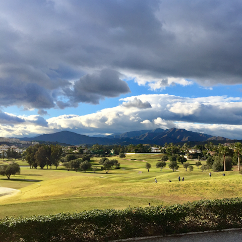 Tee off the Lauro Golf Course, overlooking the Sierra de Mijas Mountains, a short drive away