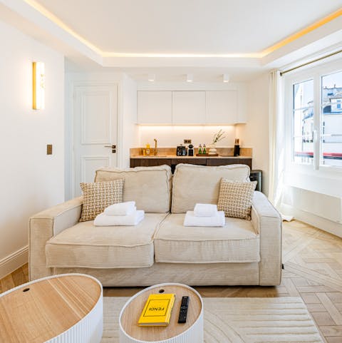 Open the windows and listen to the sounds of Parisian life on the street below