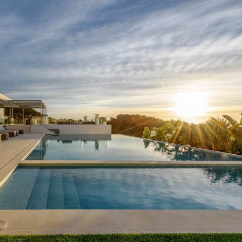 Take a sunset dip in the infinity pool
