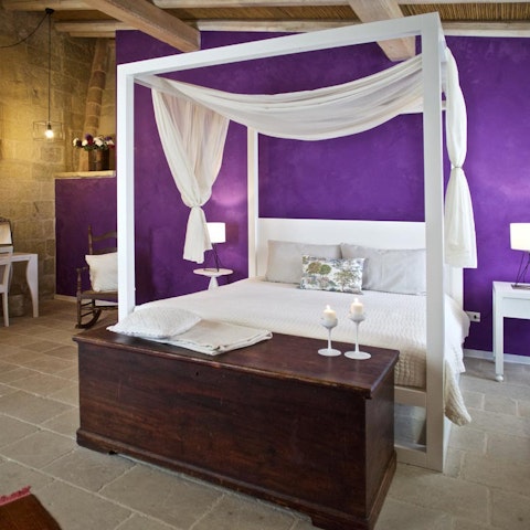 Sleep in the lap of luxury – multiple bedrooms here have four-poster beds