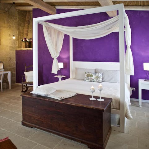 Sleep in the lap of luxury – multiple bedrooms here have four-poster beds
