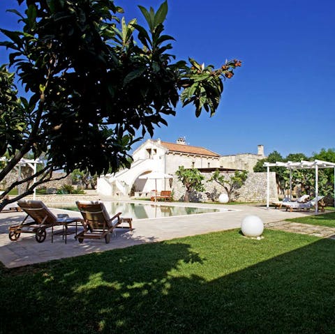Have a nap in the shade beside the pool