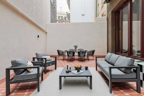 Gather around the table for drinks on the sun-warmed terracotta terrace