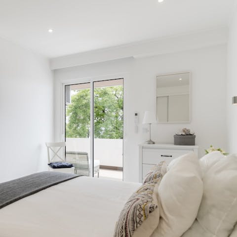 Wake up to enjoy leafy views from your private balcony