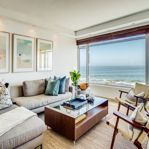 Grab a book and read curled up on the sofa, sneaking peeks at the horizon