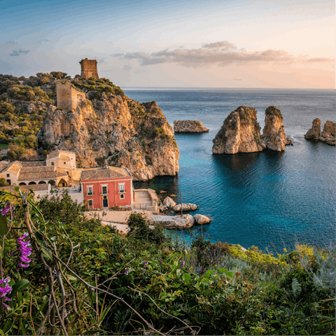Take the fifteen-minute stroll into the village of Scopello