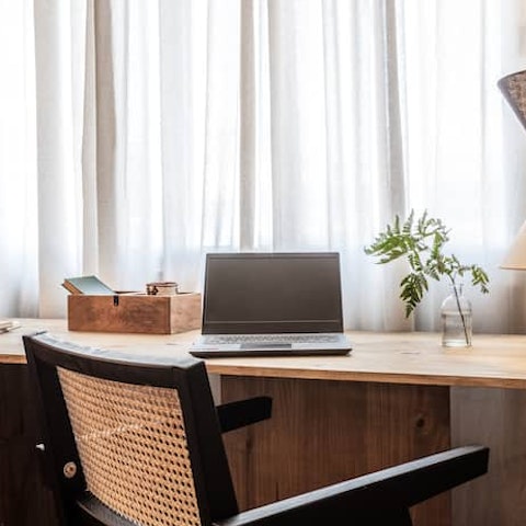 Catch up on some work at the designated desk area