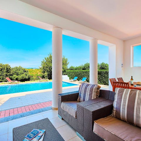 Escape from the midday heat in the comfy lounge area