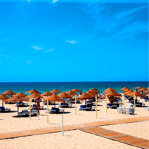 Catch a ferry over to the stunning beach island nearby