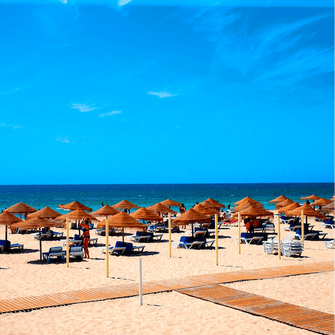 Catch a ferry over to the stunning beach island nearby